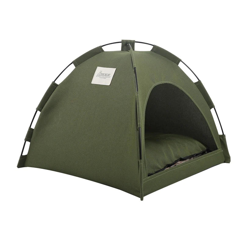 small green dome tent with pillow inside