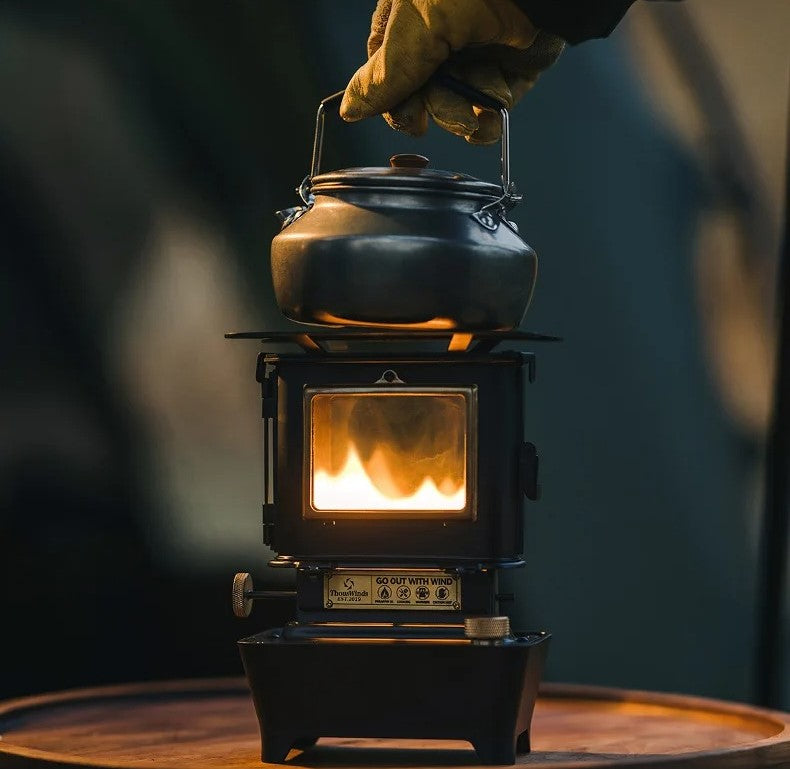 vintage black kerosene stove heating up a tea pot Ashtagoutdoors